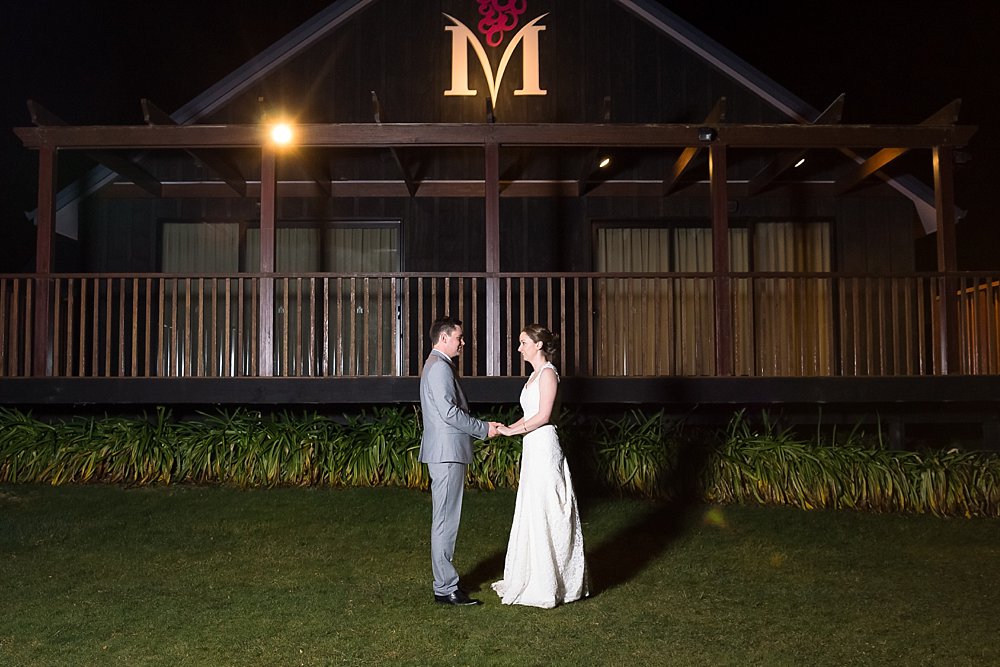 Night photo bride and groom in front of the Melton Estate Wedding Venue