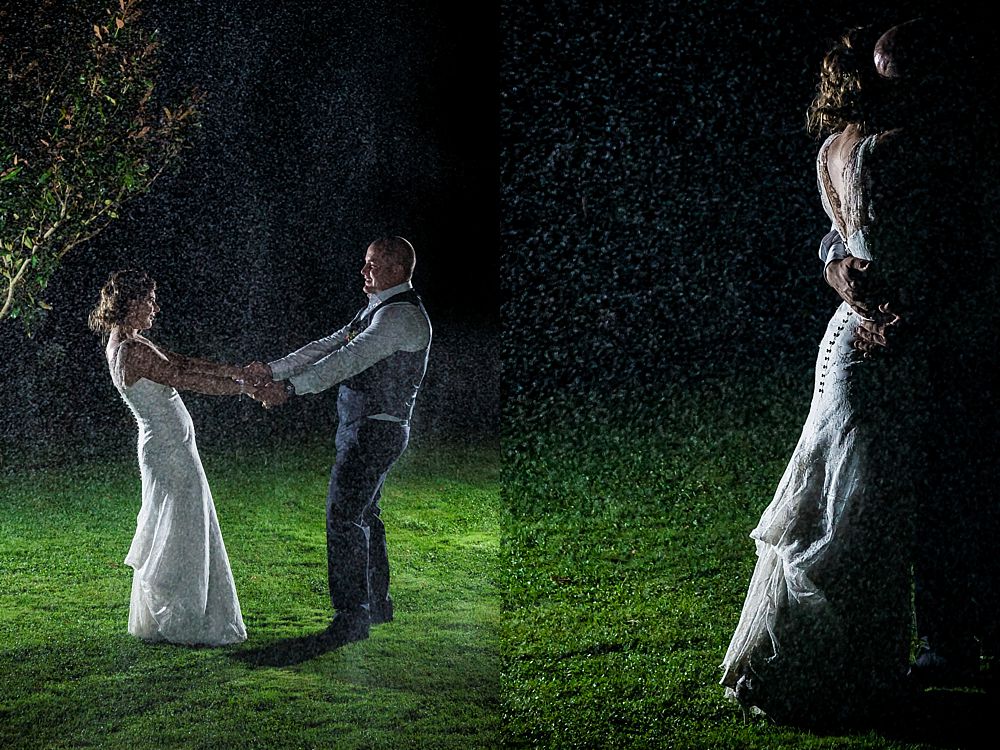 Bride and groom dance in the rain at Cossars Wineshed Wedding Venue in Christchurch