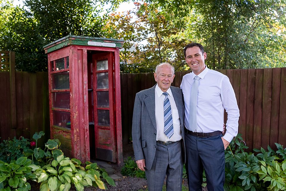 The Gym Art Centre Wedding-Groom poses for a photo with his grandfather