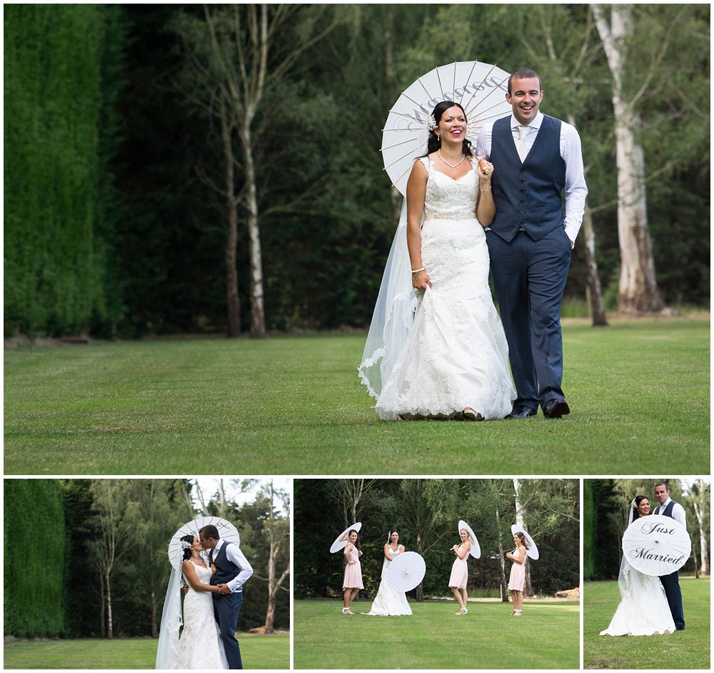 Rosemount Estate Wedding-bride and groom walking on a green field with umbrella