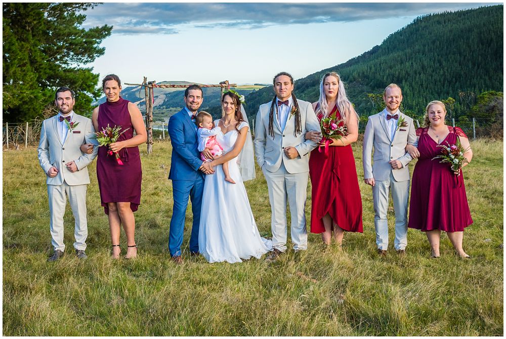 photo of the bridal party up on a ridge on farm in Loburn near Christchurch