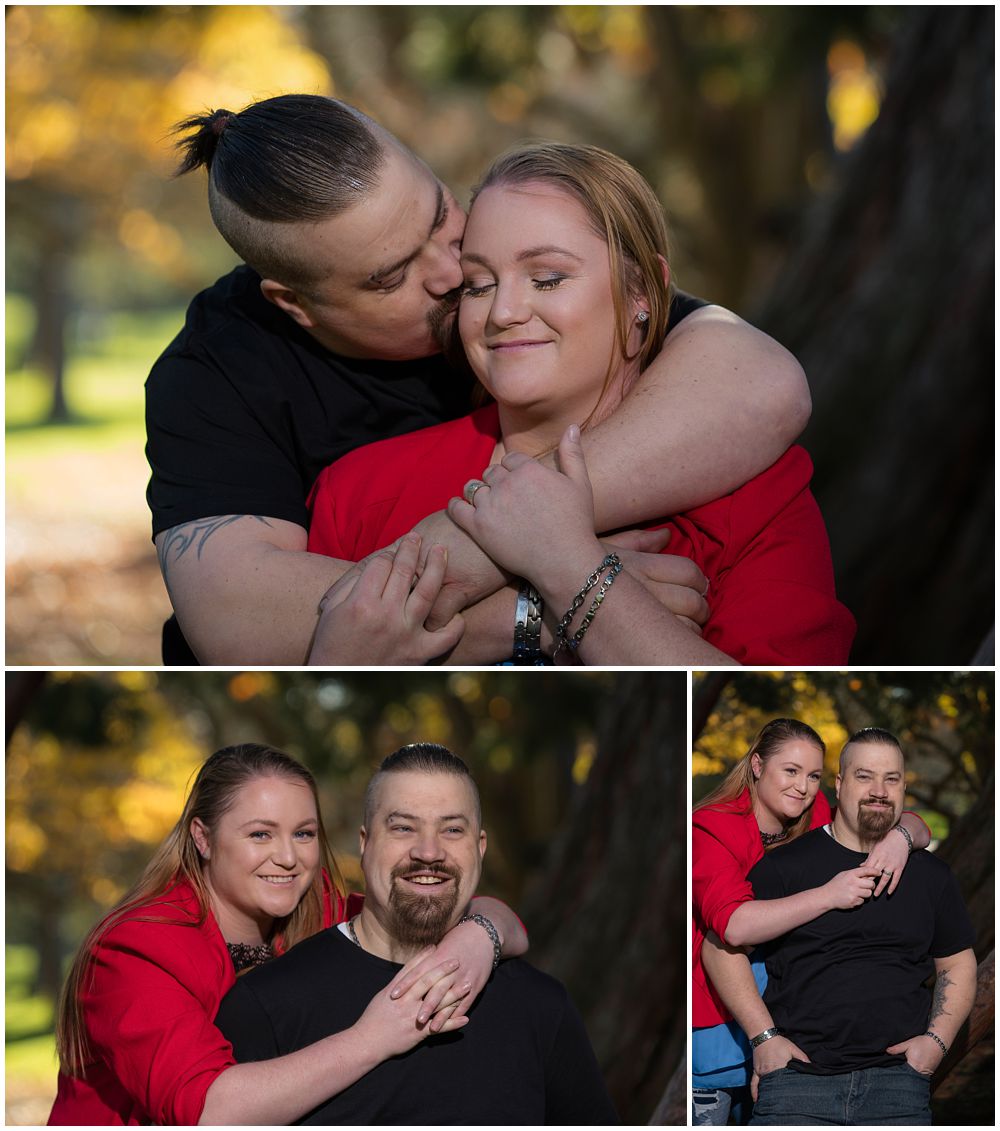 couple snuggling in the botanic gardens