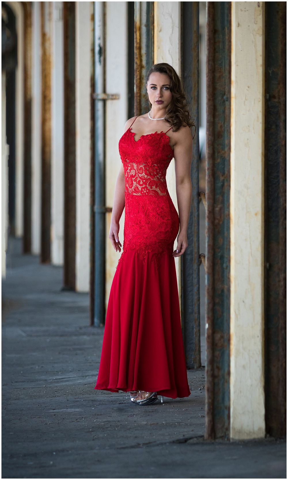 fun sassy bridal photography of bride in red dress by christchurch photographer